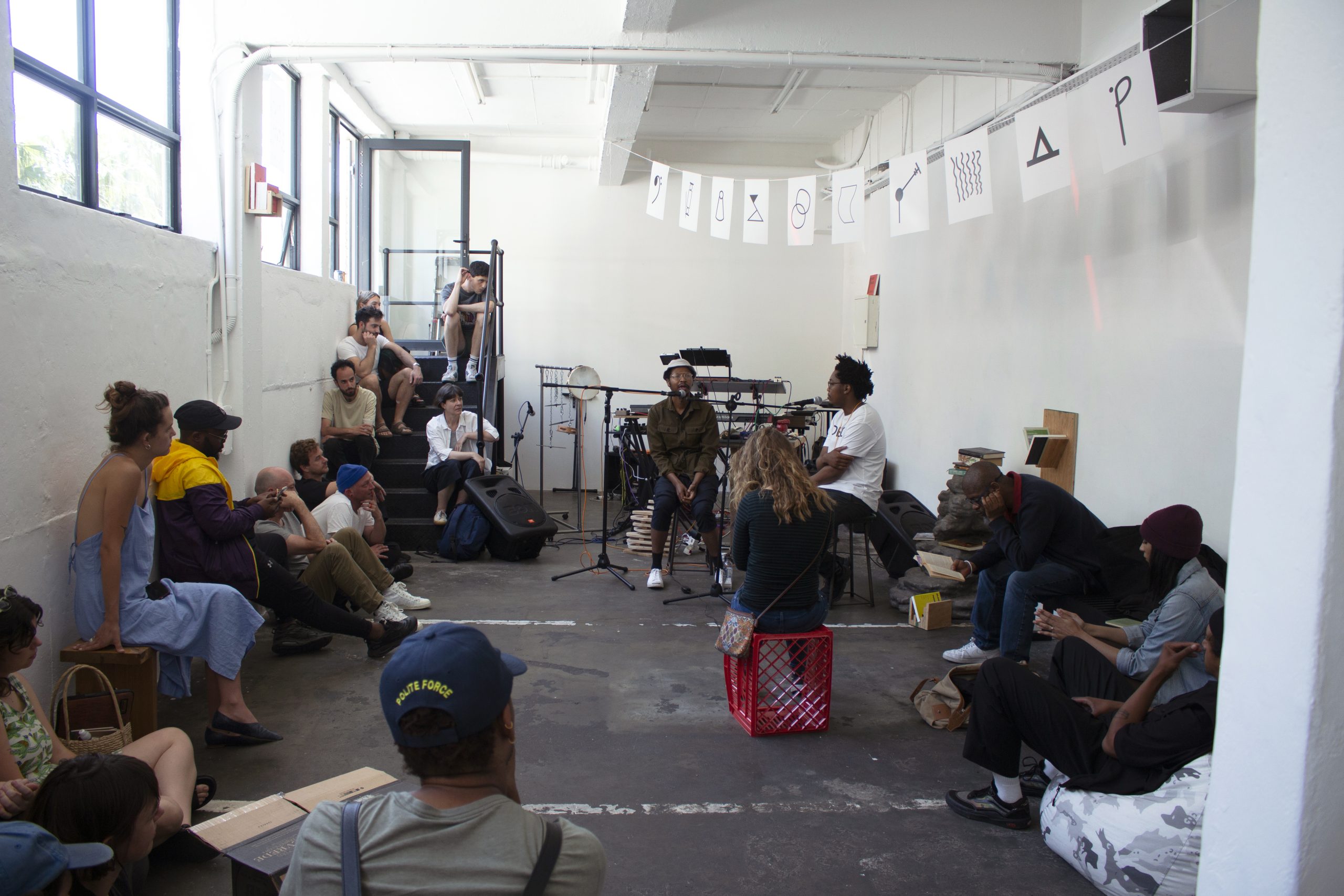 People gathered to witness Dead Symbols at Under Projects. (Image courtesy of Under Projects)