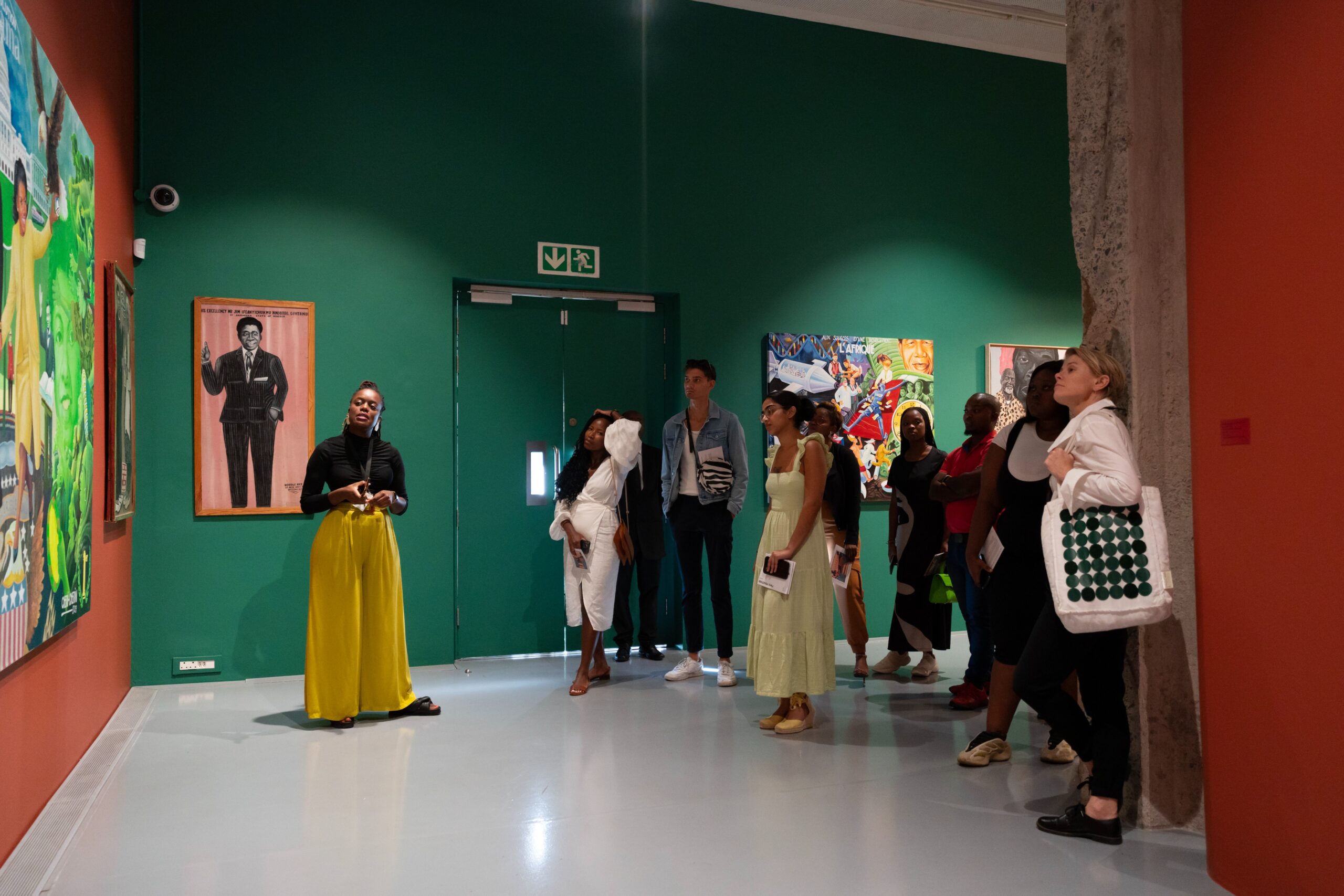 BMW Young Collectors Co. members walk through the exhibition When We See Us at Zeitz MOCAA. (Courtesy of BMW Young Collectors Co.)