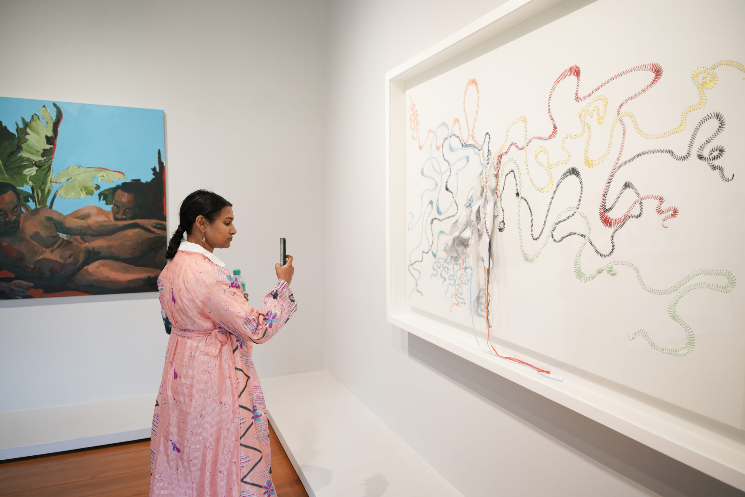 A BMW Young Collectors Co. photographs Nicholas Hlobo’s work at the Boschendal Norval Art Gallery during the 2022 Franschhoek Gallery Hop (Courtesy of BMW Young Collectors Co.)