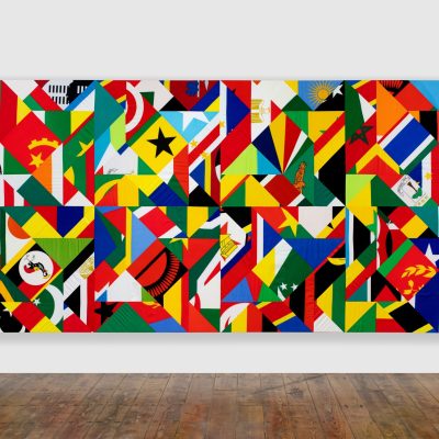Hank Willis Thomas. Tomorrow, The United States of Africa, 2023. Mixed media including contemporary African National flags. Unframed:214 x 423.5 cm. (Photography by Nina Lieska/ Courtesy of Goodman Gallery)