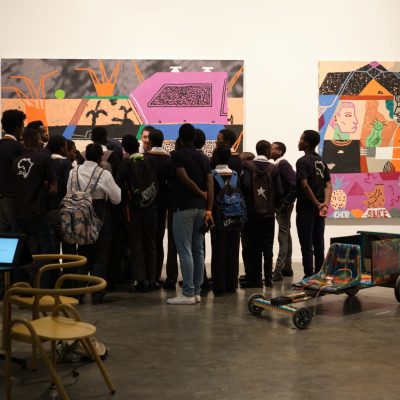 Students visit KALASHNIKOVV’s booth in the gallery HUB pavilion as a part of the educational programme during the 15th edition of FNB Art Joburg. (Image courtesy of FNB Art Joburg)
